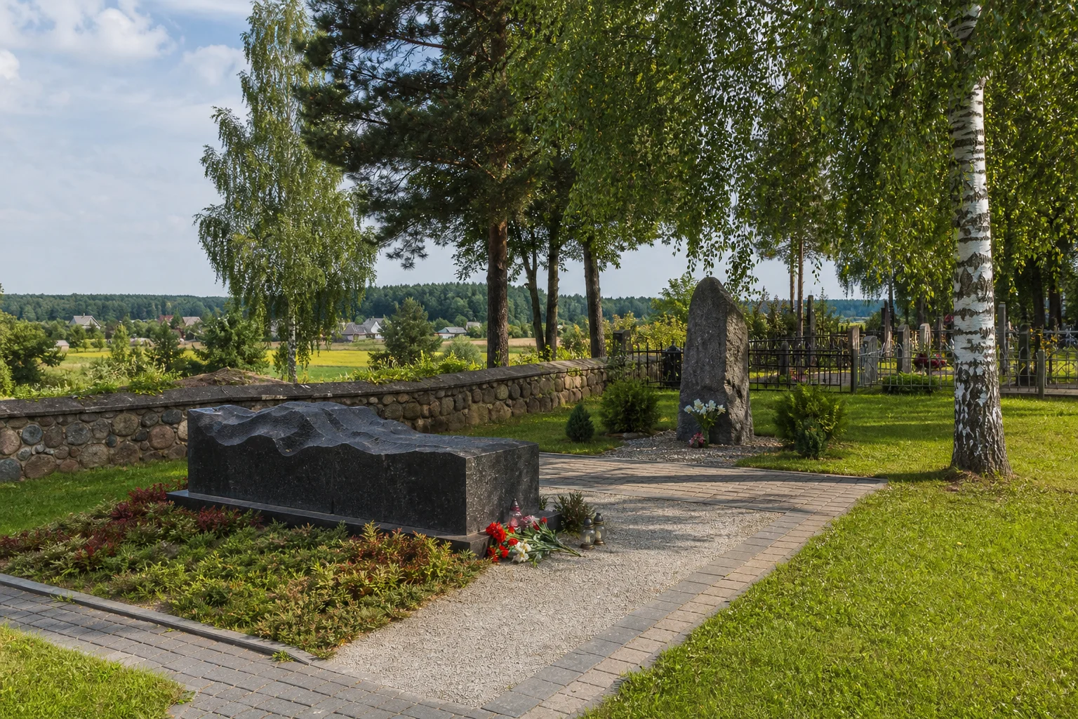 Захоронение на сельском кладбище д. Кальчицы