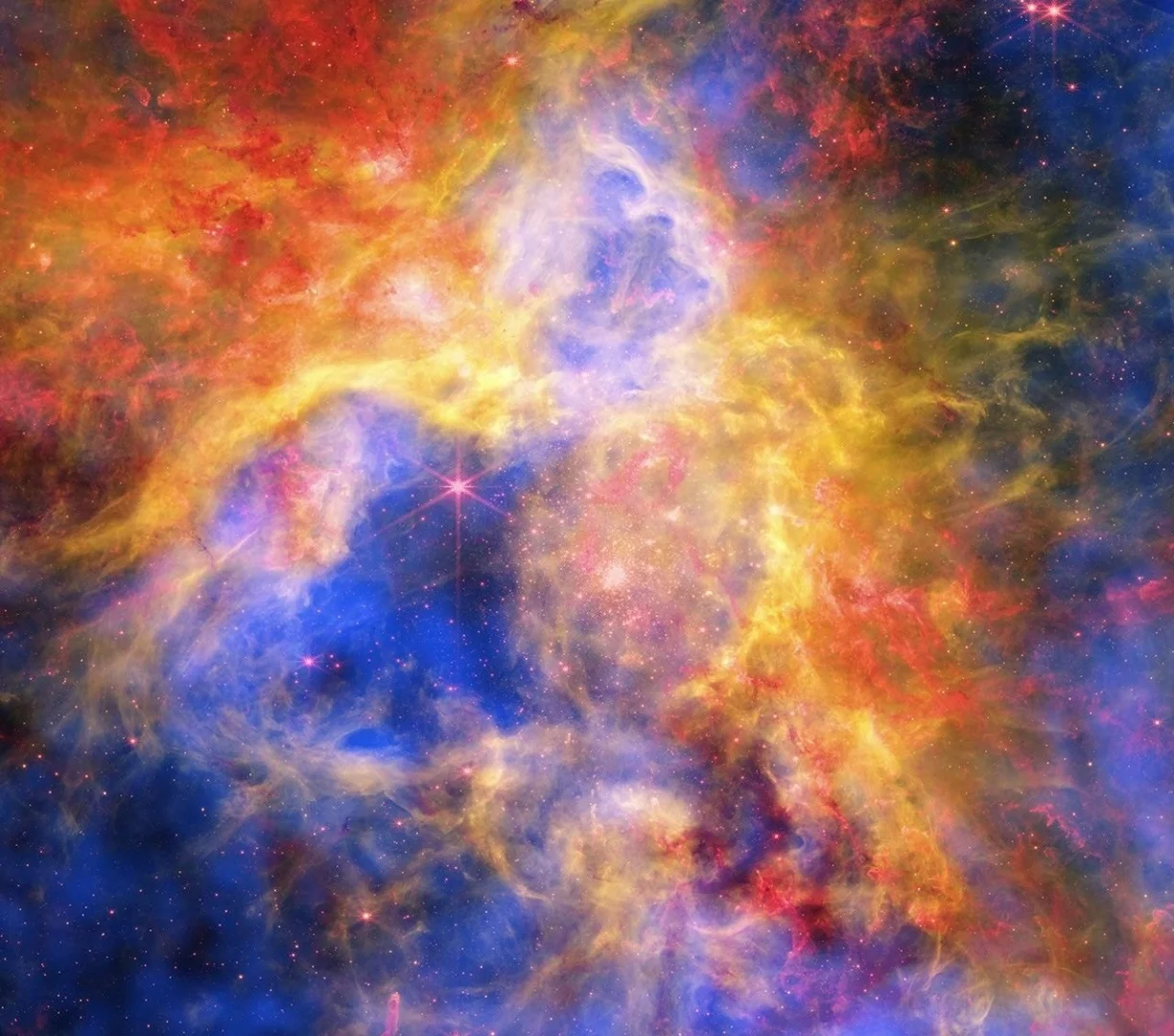 Телескопы NASA создали яркую мозаику туманности Тарантул